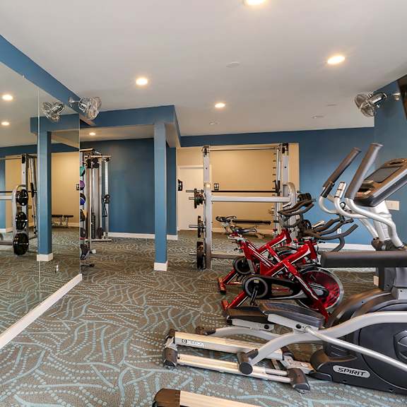 fitness center with free weights and exercise equipment  at oceanaire apartment homes, pacifica, ca, 94044
