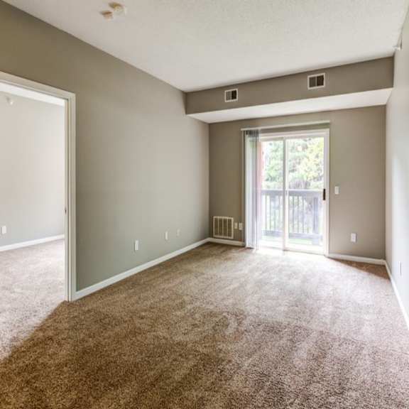 carpeted living area at the atwood at eden prairie, eden prairie