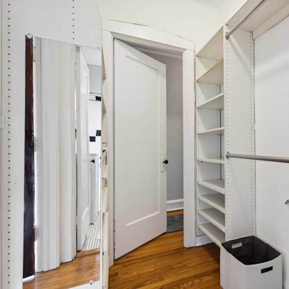 a room with a closet and a trash can in it at the bryant at oak park i & ii, oak park, il 60302