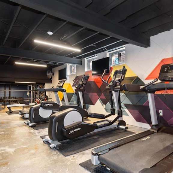 gym with treadmills and other exercise equipment at renew madison, madison, wisconsin