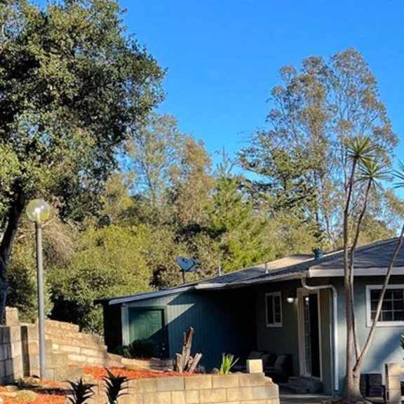 house surrounded by trees at salinas sunset apartments, salinas