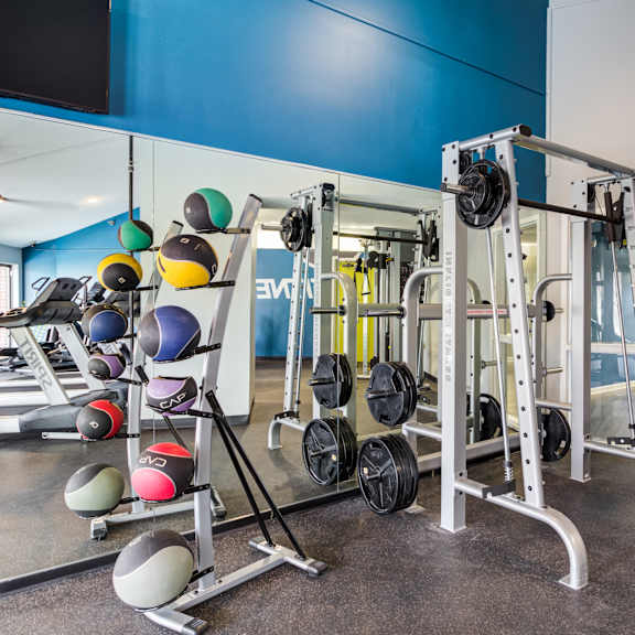 a gym with weights and other exercise equipment