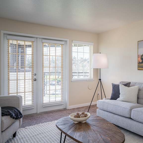 a living room with a couch and a coffee table at sundial apartments, wilsonville oregon