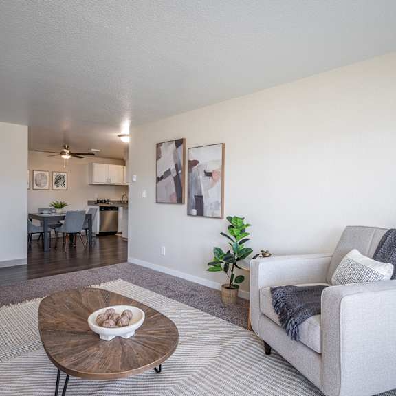 a living room with a couch and a coffee table at sundial apartments, wilsonville, 97070
