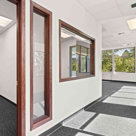 office space in a building with doors and windows