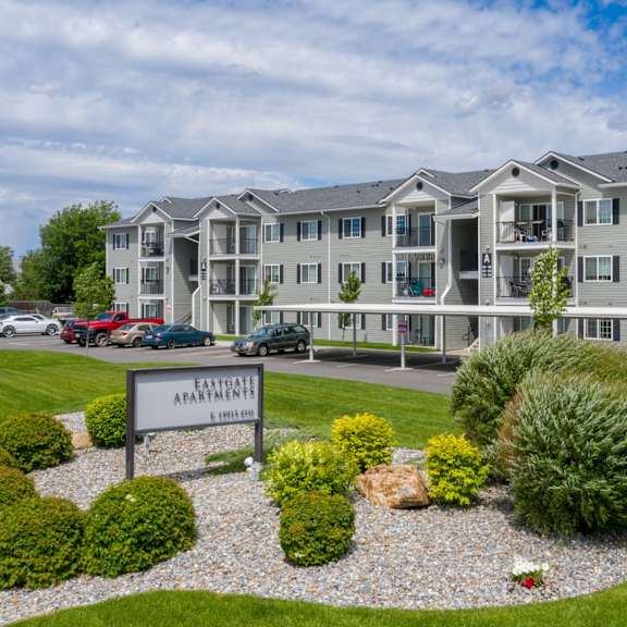 a building with the sign "fairway apartments" in front of it.