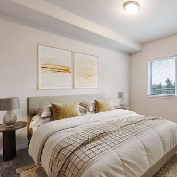 a bedroom with a large bed and a chair.