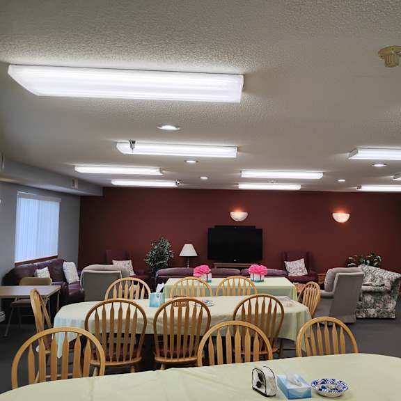 a conference room with a long table and chairs.