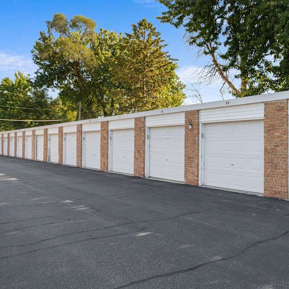 a long row of garage doors are closed.