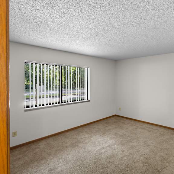 a room with a window and a door.
