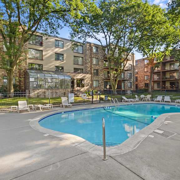 our apartments have a swimming pool with chairs