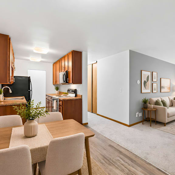 a modern living room with a dining table and chairs.