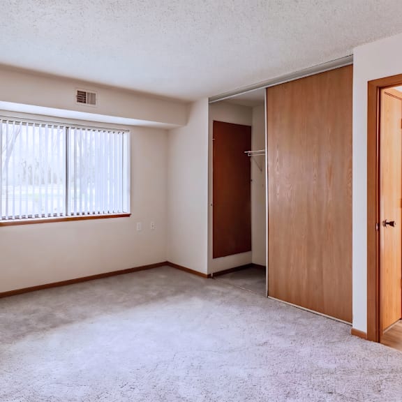 a room with a window and a door.