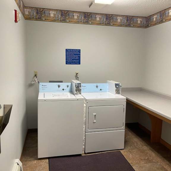 a bathroom with a sink and a toilet.