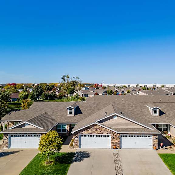 a residential area with houses and driveways.