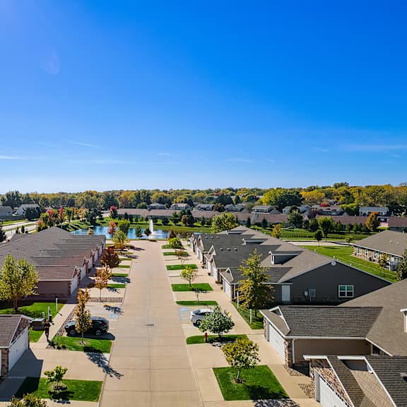 a suburban neighborhood with rows of houses and trees.