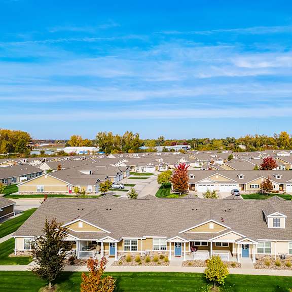 a suburban neighborhood with houses and trees.