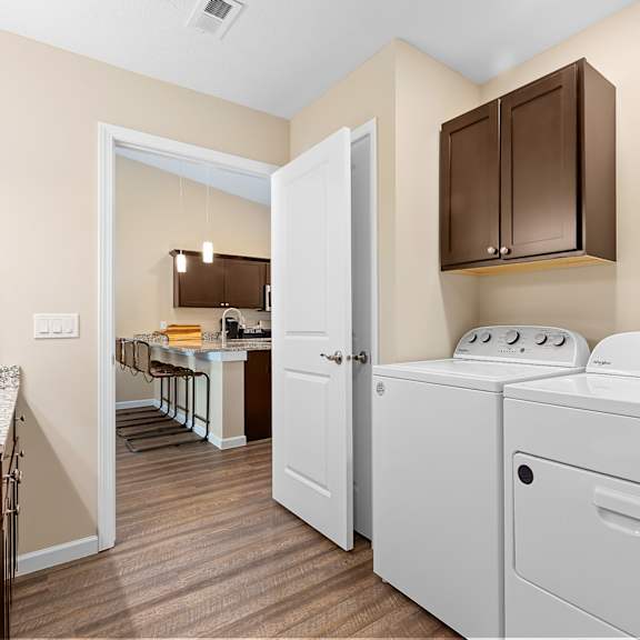 a laundry room with a washer and dryer.