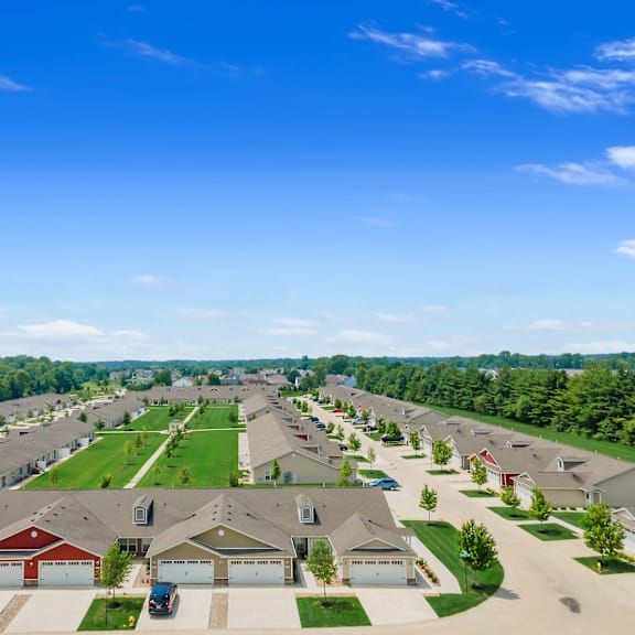 a suburban neighborhood with houses and driveways.