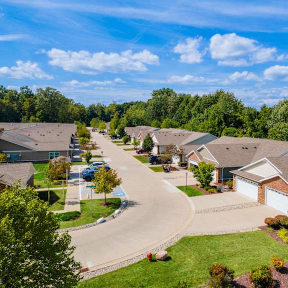 a residential neighborhood with houses and driveways.