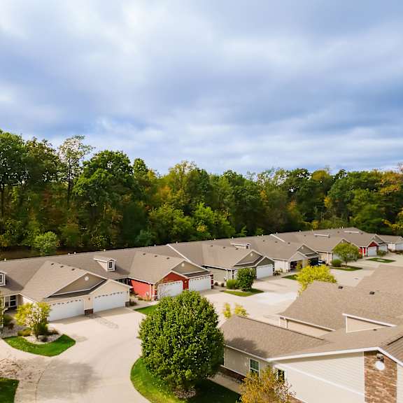 a suburban neighborhood with houses and trees.
