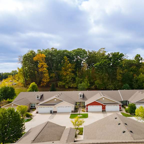 a suburban neighborhood with houses and trees.