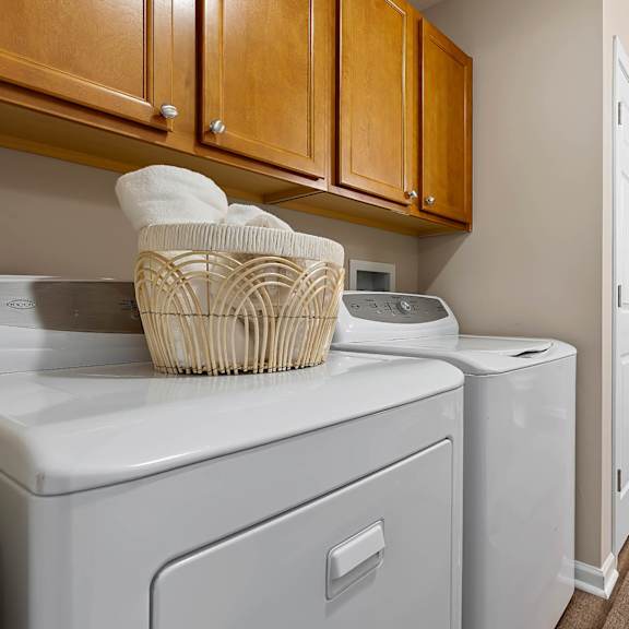 a laundry room with a washer and dryer.
