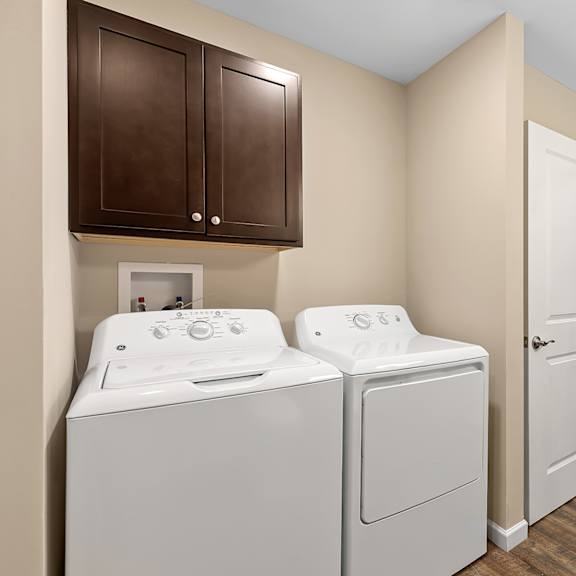 a laundry room with a washer and dryer.