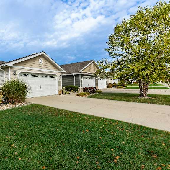 a house with a garage and a driveway.