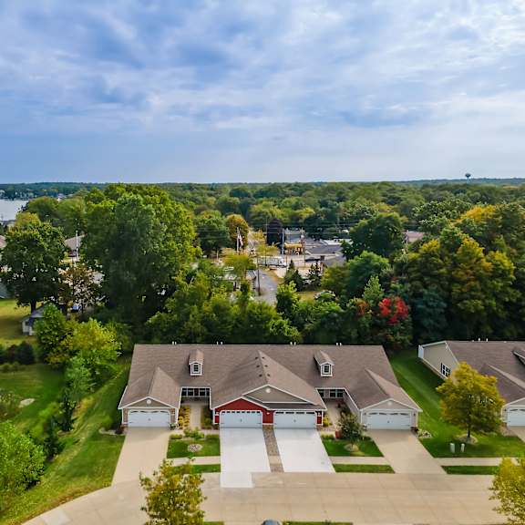 a suburban neighborhood with houses and trees.