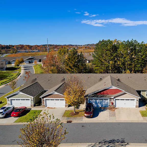 a suburban neighborhood with houses and trees.