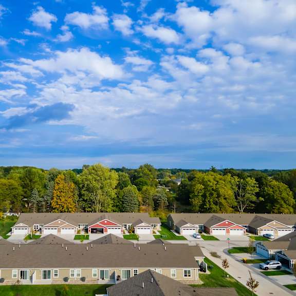 a suburban neighborhood with houses and trees.