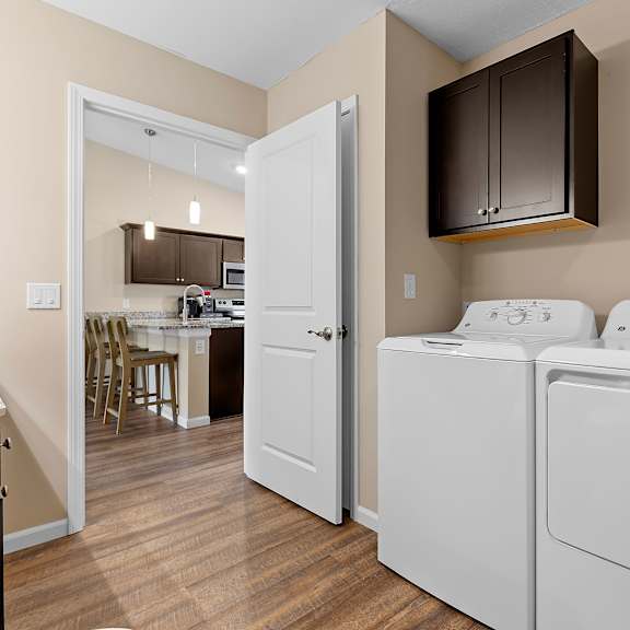 a laundry room with a washer and dryer.