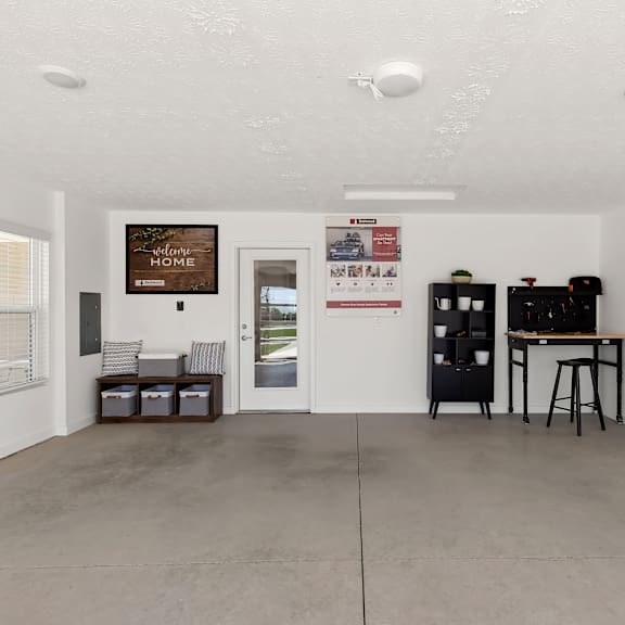 a room with a white wall and a brown sign on it.