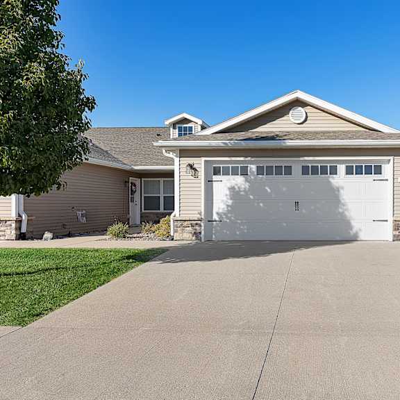 a house with a garage door that says "hotel" on it.