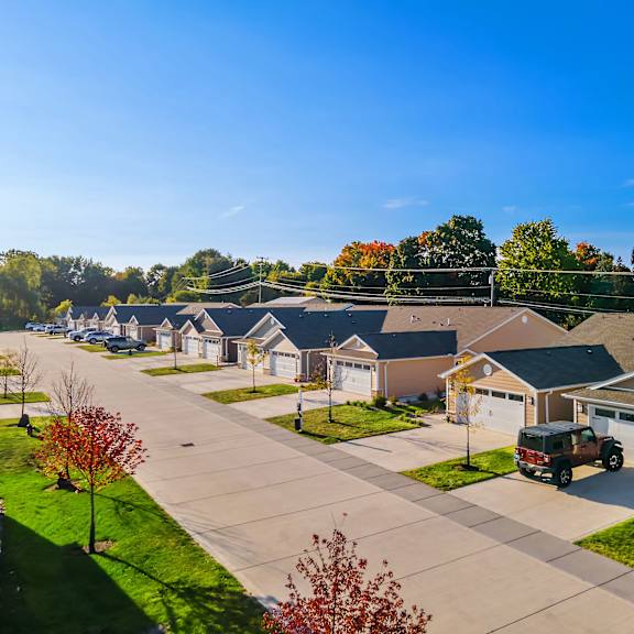 a suburban neighborhood with houses and trees.