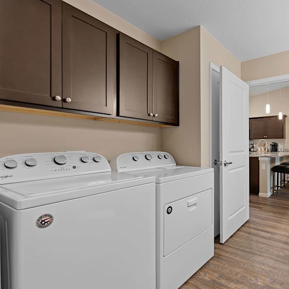 a laundry room with a washer and dryer.