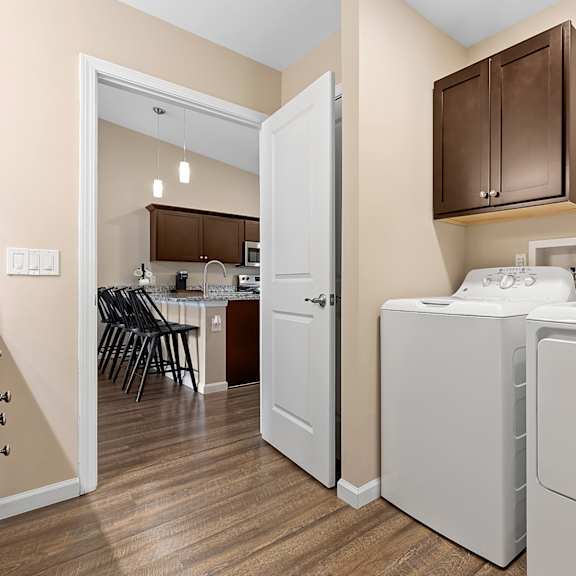 a laundry room with a washer and dryer.