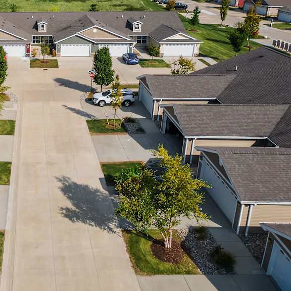 a residential area with houses and cars.