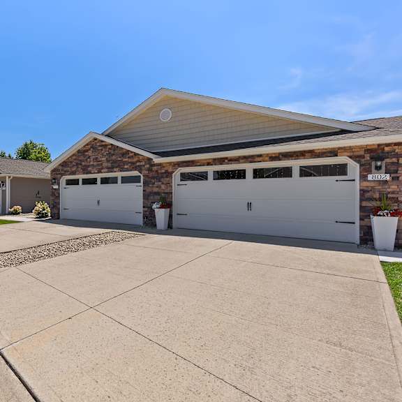 a house with a garage and a driveway.