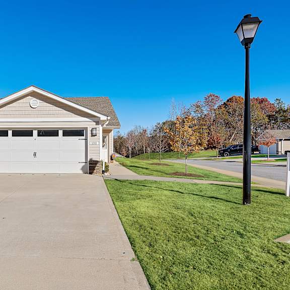 a house with a garage and a driveway.