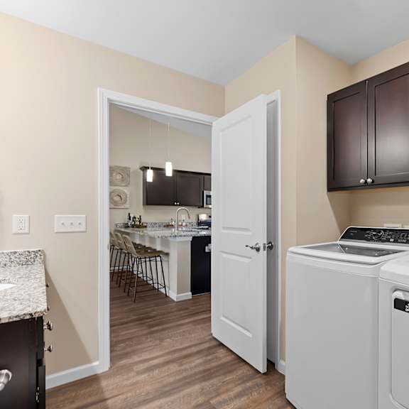 a laundry room with a washer and dryer.
