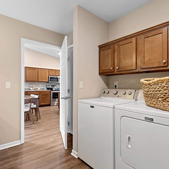 a laundry room with a washer and dryer.