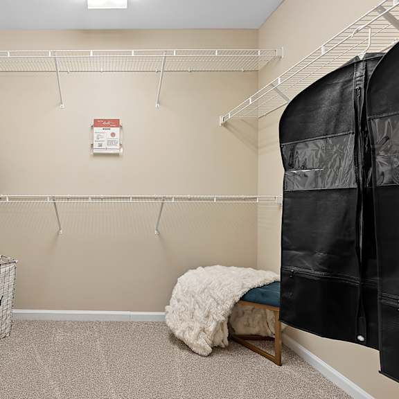 a laundry room with a washer and dryer in a small space.