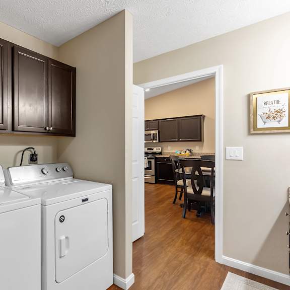 a laundry room with a washer and dryer.