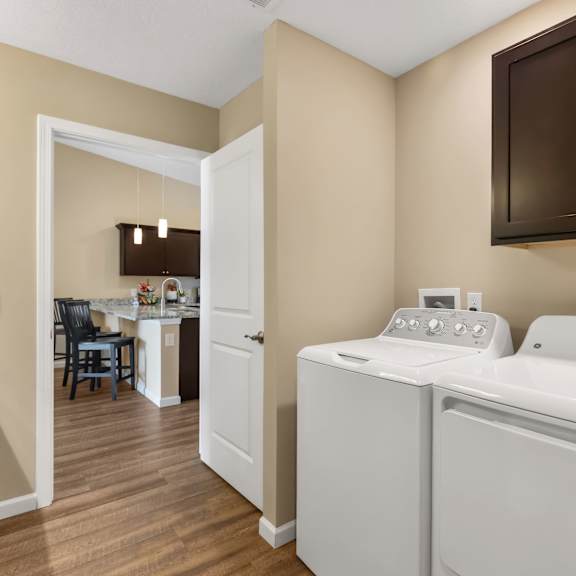 a laundry room with a washer and dryer.
