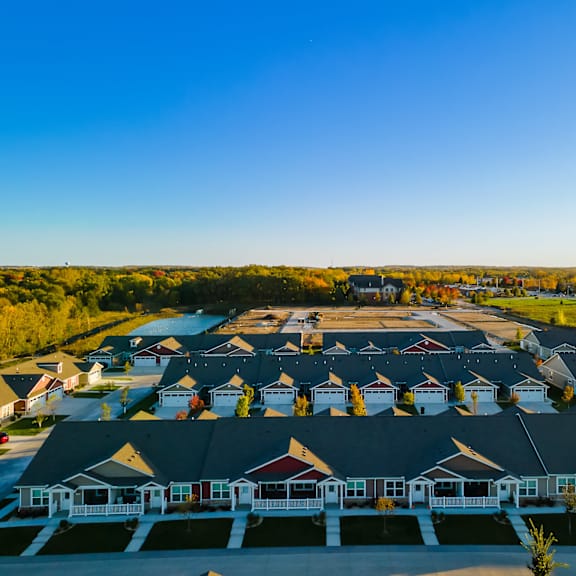 a suburban neighborhood with houses and driveways.
