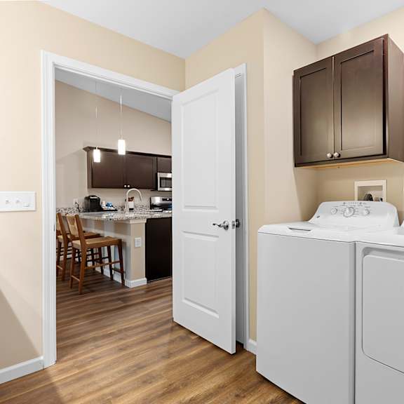 a laundry room with a washer and dryer.