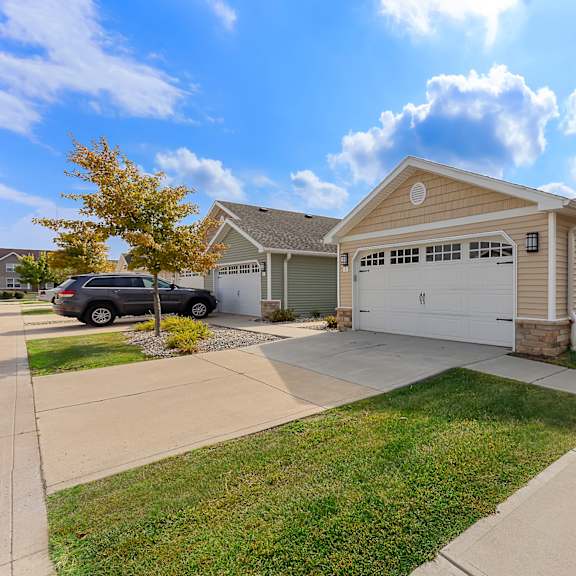a house with a garage and a driveway.
