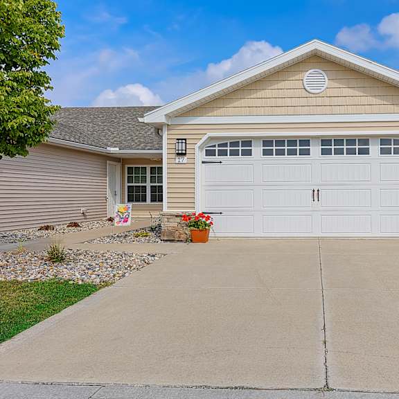 a house with a garage and a driveway.